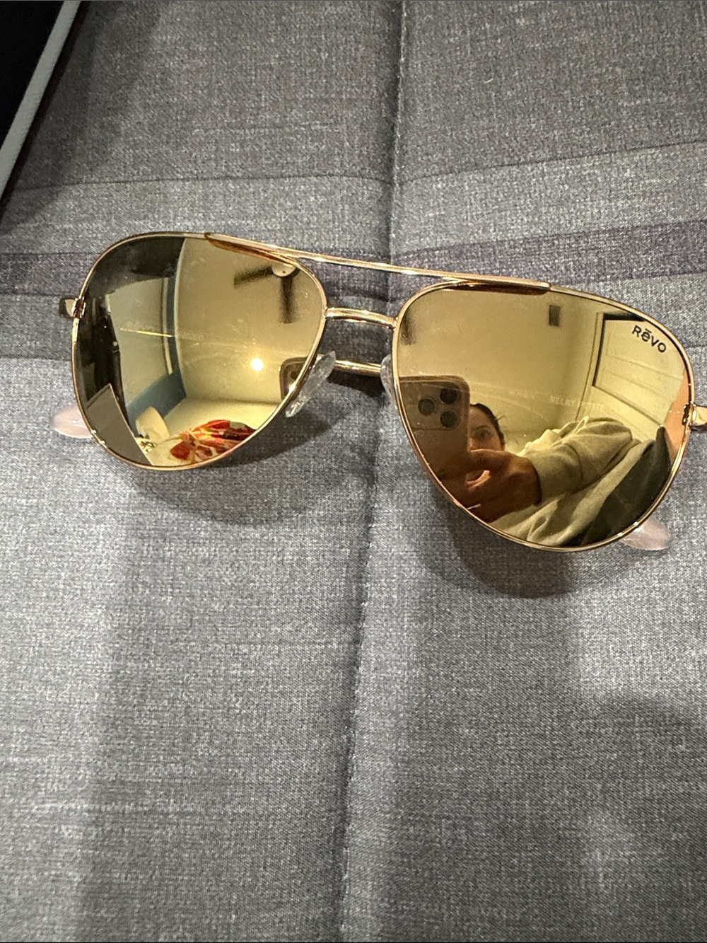 Revo Women's Gold Aviator Sunglasses with Mirrored Amber Lenses